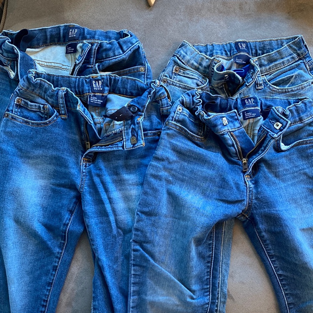 Lot of 4 pairs of Gap Kids jeans. Size 7 stretch with various styles.